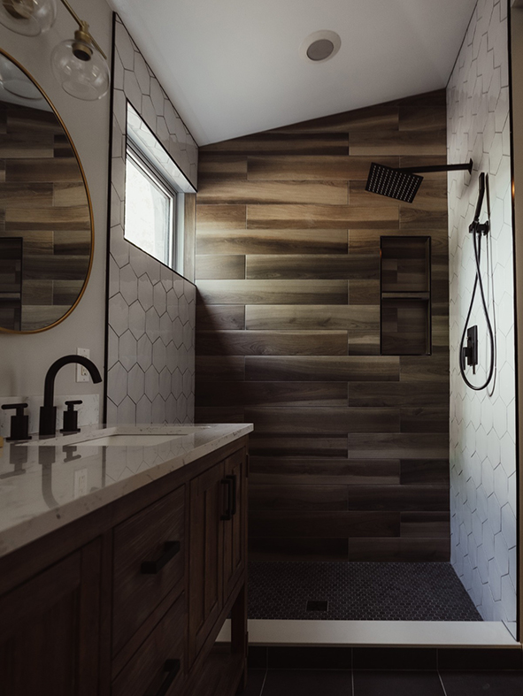 Custom bathroom remodeling Asheville - hexagonal tile with wood-style tile and custom niche 12x28